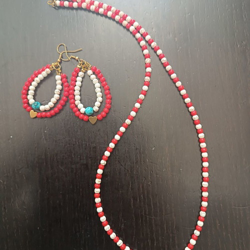 Handmade necklace with white, red beads and turquoise detail