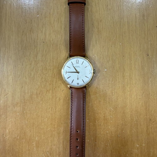Technos wind-up watch like new, unisex, gold color