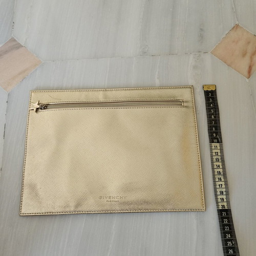 Givenchy pouch like new, gold