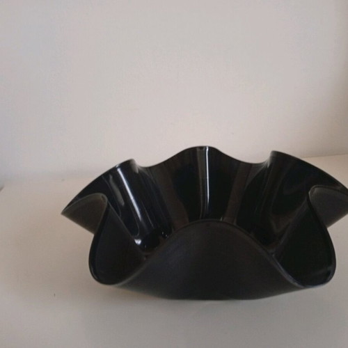 Bowl made from vinyl record used, asymmetrical