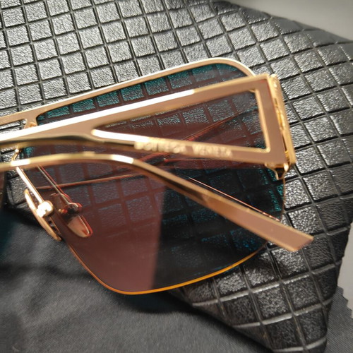 Bottega Veneta BV1065S sunglasses like new, multicolor lenses