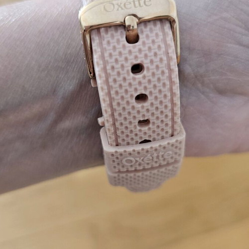 Oxette quartz watch used with bracelet and pink gold ring