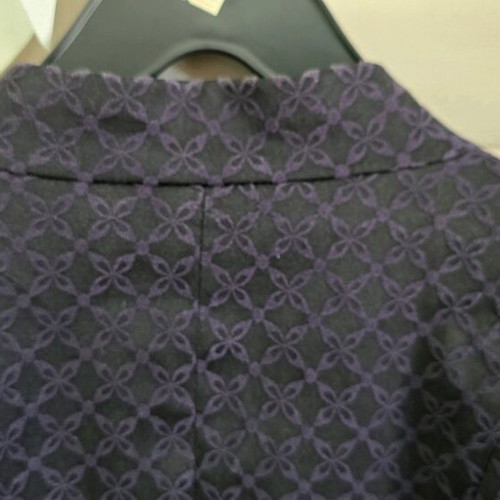 Black H&M jacket with three-quarter sleeve and purple embroidery size medium like new