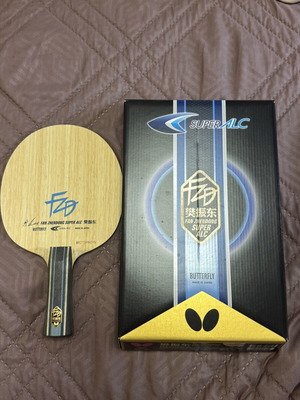 Butterfly Fan Zhendong Super ALC table tennis blade with FL handle and bonus rubbers