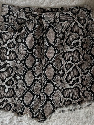 Zara φούστα animal print ασύμμετρη σαν καινούργια, μπεζ καφέ