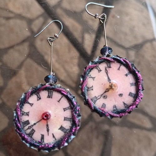Clock earrings used, long and impressive