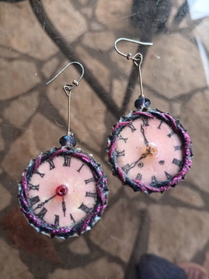 Clock earrings used, long and impressive