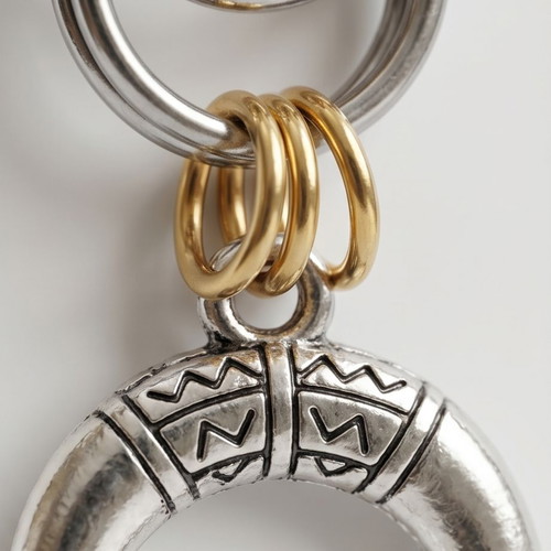 Steel earrings with gold-silver bicolor and crescent moon design