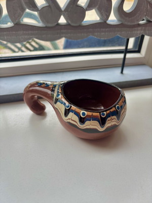 Bulgarian ceramic cup used with traditional folk art decoration