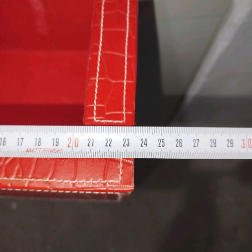Shelf with red leather upholstery used, 5 compartments for CDs