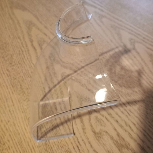 Jewelry stands used, one large transparent and one small matte