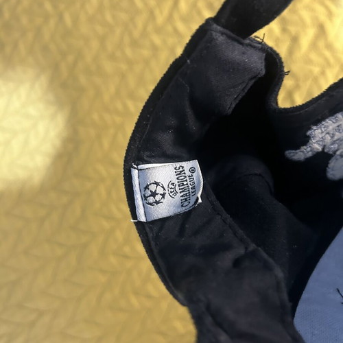 AEK Champions League hat used, adjustable, black and yellow