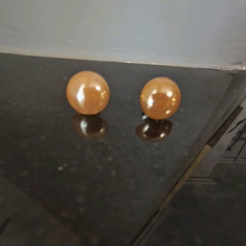Button earrings in bright honey glossy color like new