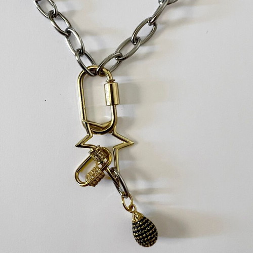 Long pendant with silver chain and gold rings, star and diamond-shaped drop