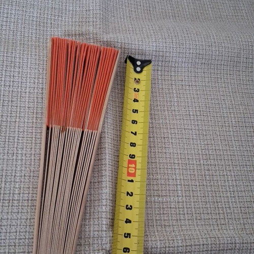 Fan refurbished with wooden base and orange fabric