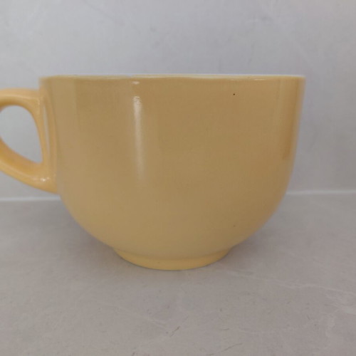 Cup like new, yellow with white interior, suitable for cereals