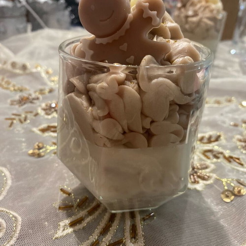 Christmas soy candle with melomakarono scent in glass cup and wax melts