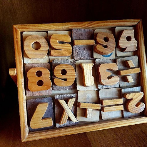 Educational game letters & numbers used, made of wood
