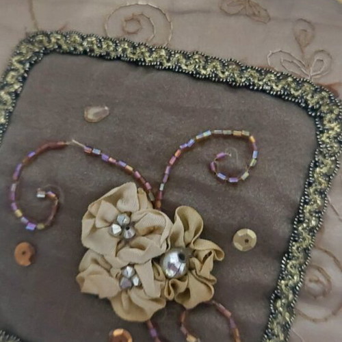Vintage decorative pillow used with embroidery and beads