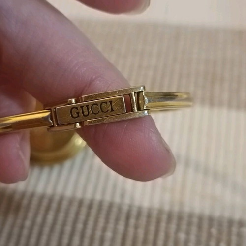 Gucci vintage style wristwatch used with interchangeable colorful bezels