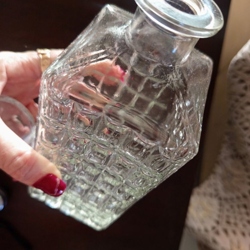 Square glass bottle vintage with embossed design without stopper