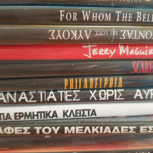 DVD pack of 55 new, 40 in hard case and 15 in paper
