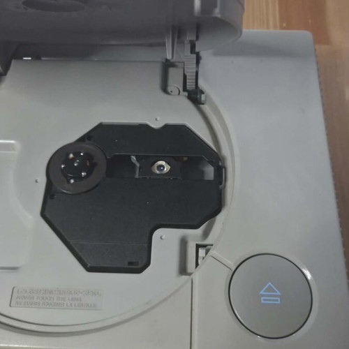 Sony PlayStation 1 console used with memory card, controller, and game