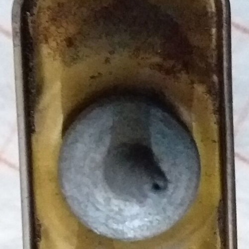 Set of 4 used oil collectors with iron, tin, and plastic