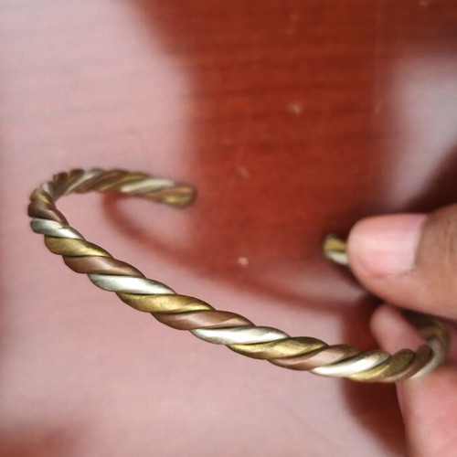 Vintage bracelet in silver, bronze and gold