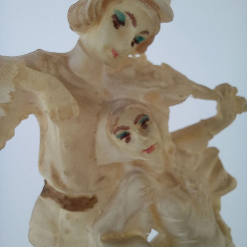 Vintage couple figurine like new resin with wooden base