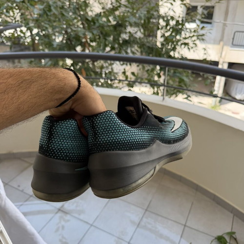Nike athletic shoes, black and blue, size 44.5