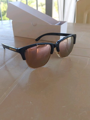 Hawkers sunglasses new, black and gold