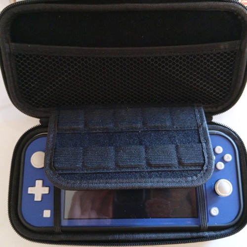 Nintendo Switch Lite like new with accessories, SD card, and game