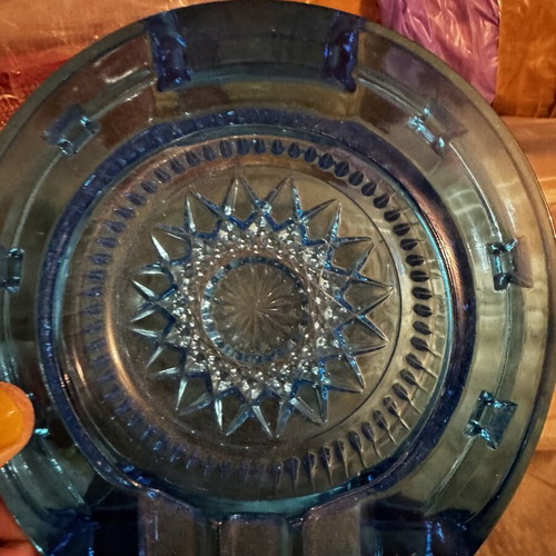Blue glass decorative ashtray like new, carved glass