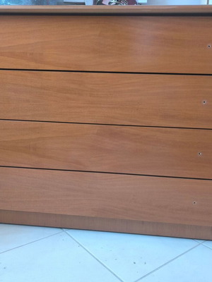 Living room furniture set with console, bookcase, and drawer unit