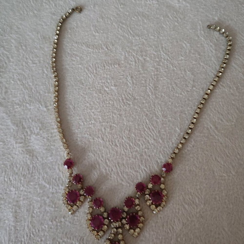 Antique necklace used with pink stones and gold rhinestones