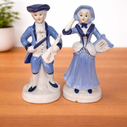 Vintage musical couple figurine with blue clothes like new