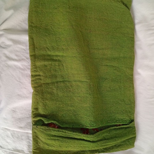 Embroidered green pillowcase used with details