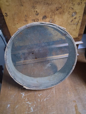Wooden sieve used, old with holes