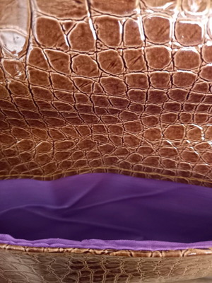 Envelope bag like new, chocolate color with purple interior and magnetic closure