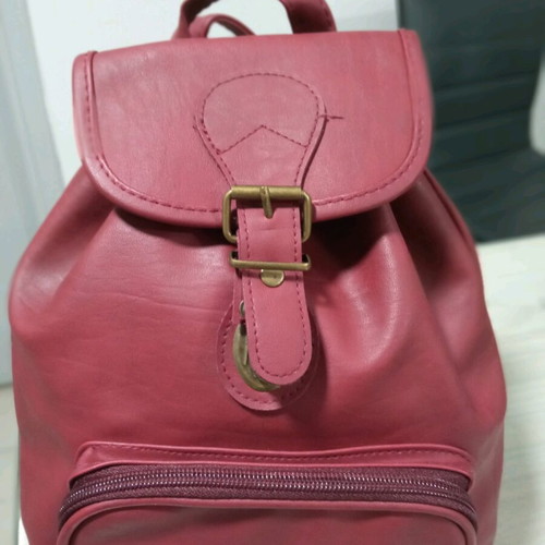 Leather backpack new with internal and front pocket
