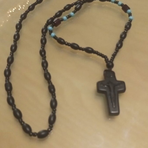 Men's black cross made of natural stone like new