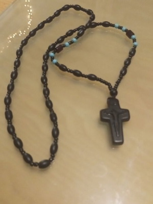 Men's black cross made of natural stone like new