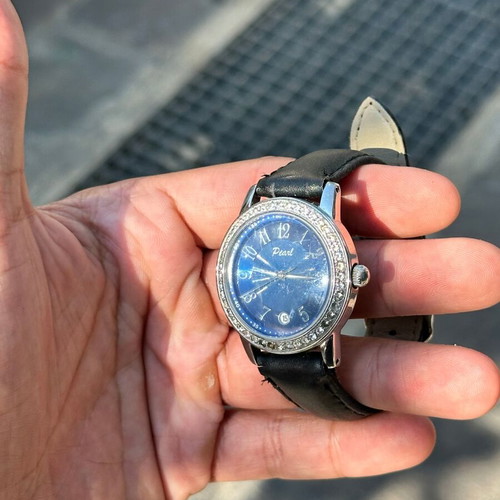 Vintage Pearl wristwatch with blue dial and stones