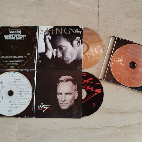 CDs used, pack of 5 with Sting, Oasis, Pink Floyd, Notorius
