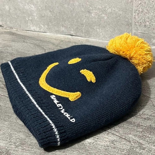 Smiley knitted hat used with sherpa lining
