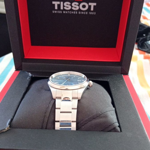 Tissot watch new with light blue dial and steel bracelet
