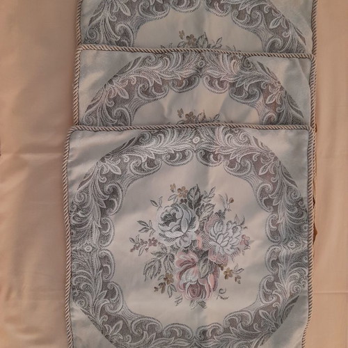 Three embroidered sofa pillowcases