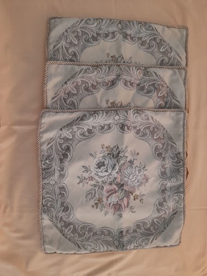 Three embroidered sofa pillowcases