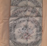 Three embroidered sofa pillowcases